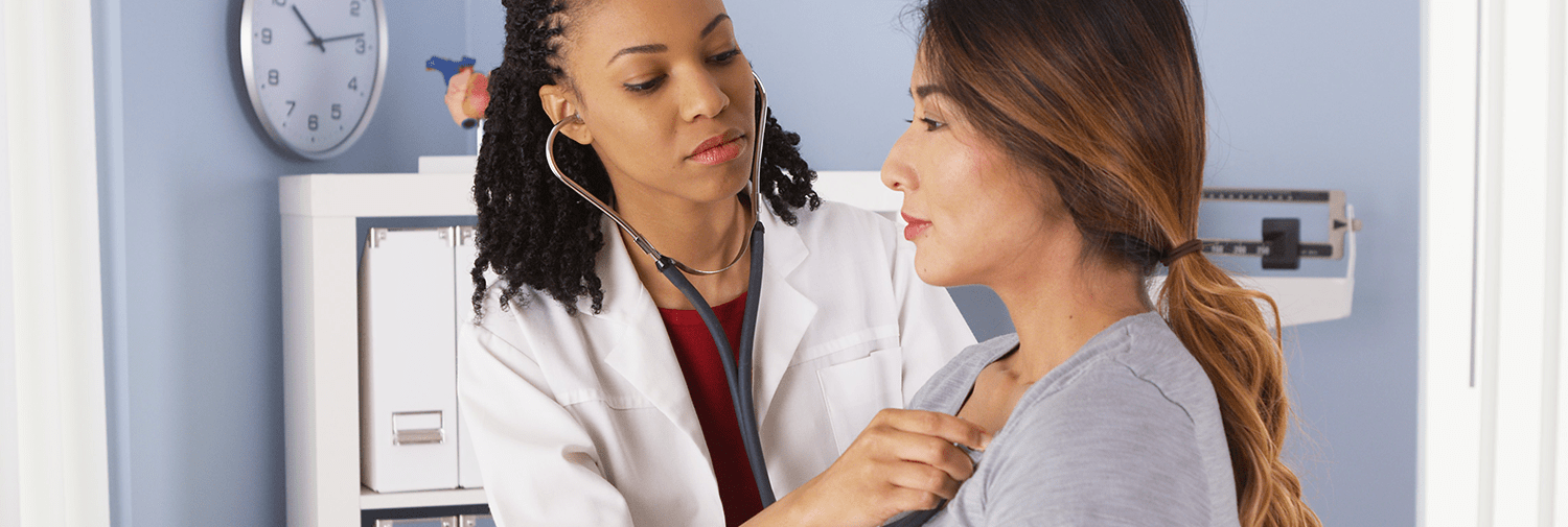 doctor conducting immigration medical exam