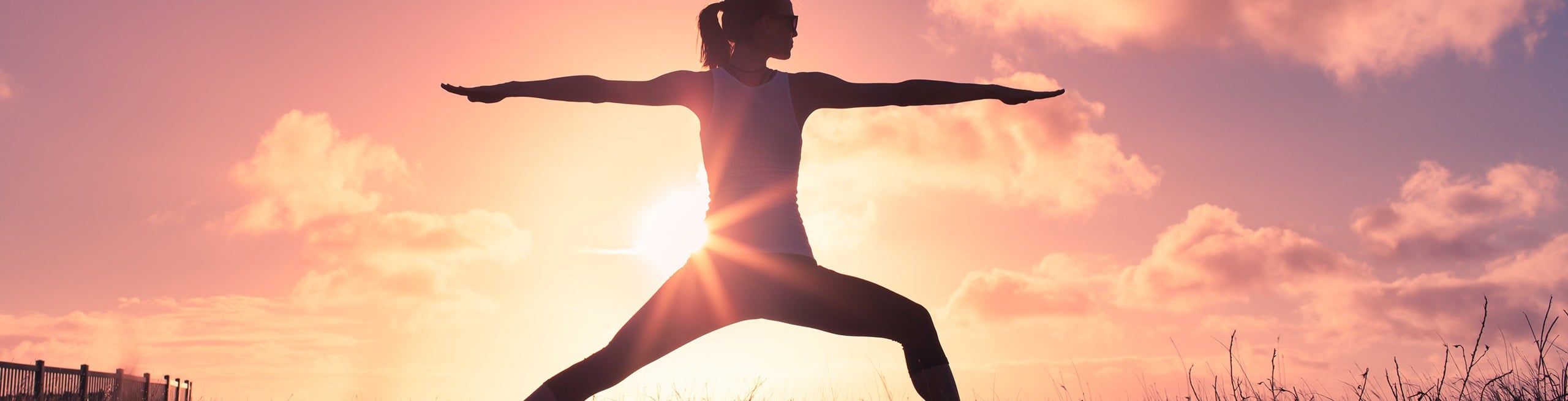 balanced woman practicing yoga