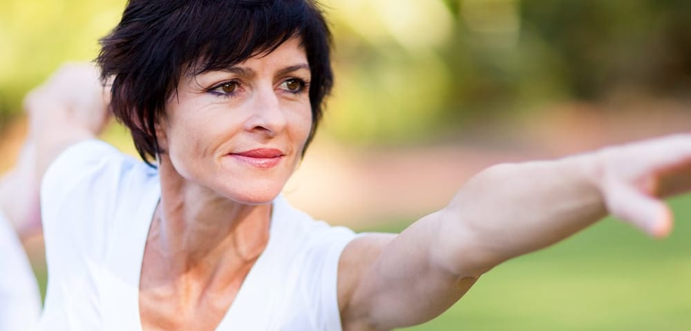 women practicing yoga as treatment for menopause
