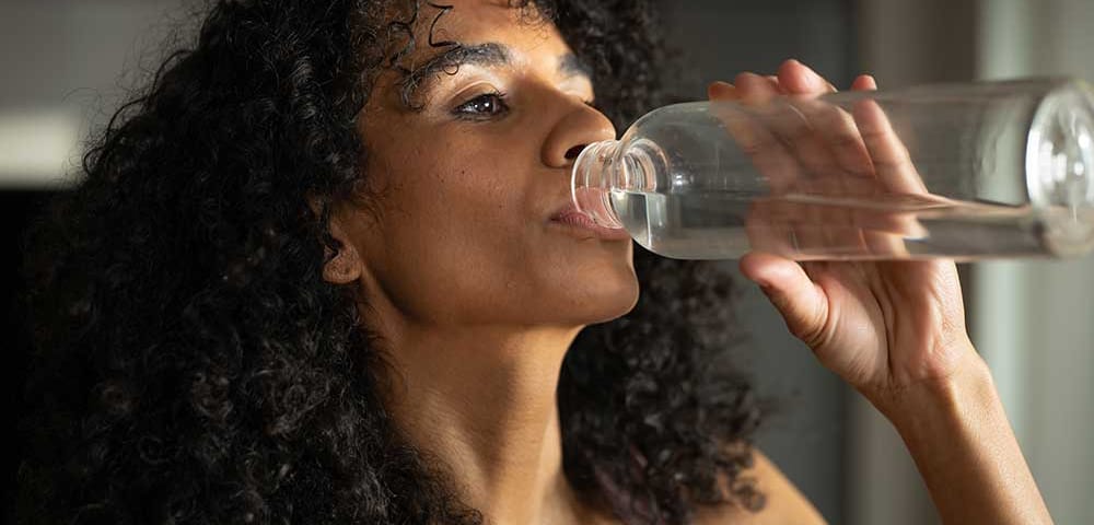 woman with excessive thirst due to hormonal imbalance