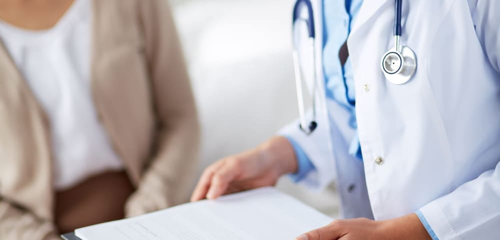 a boutique doctor holding a clipboard