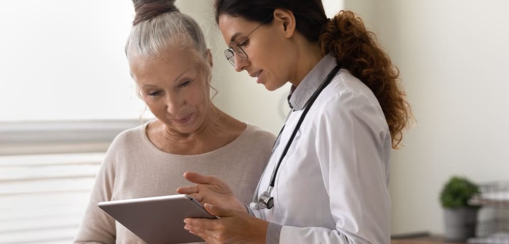a woman talking to her doctor about menopause