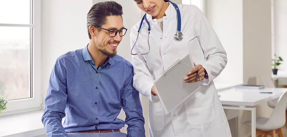 a doctor discussing how TMS therapy works