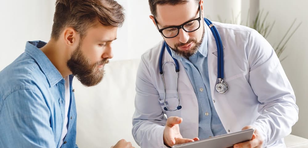 a man talking to his doctor