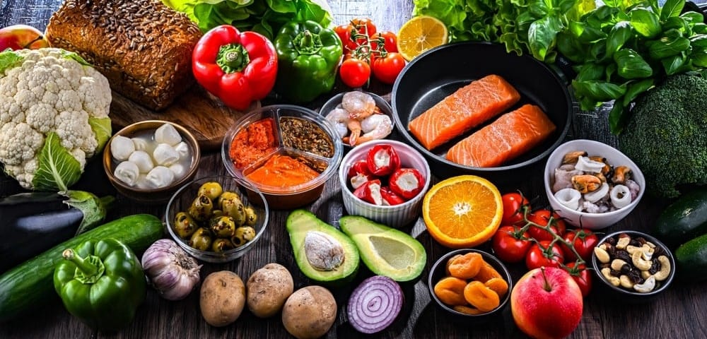 Foods that are in the Mediterranean Diet like fruits and vegetables, nuts, and fish.
