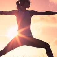 balanced woman practicing yoga