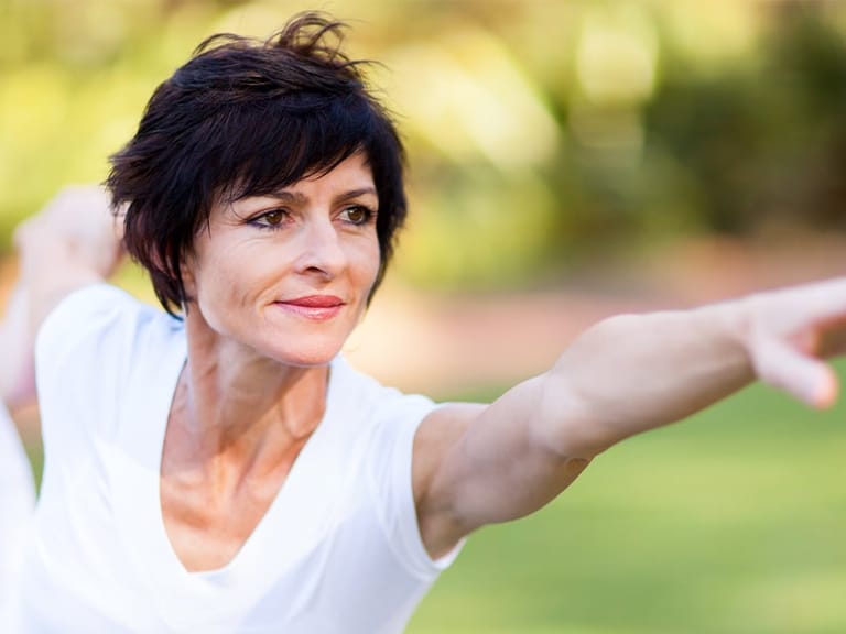 women practicing yoga as treatment for menopause