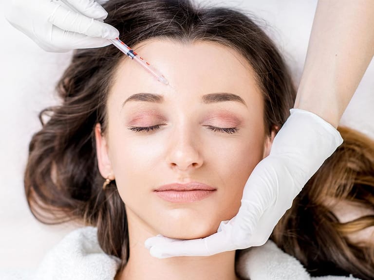 Woman receiving Botox injection