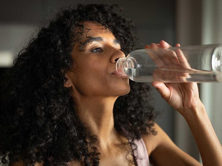 woman with excessive thirst due to hormonal imbalance