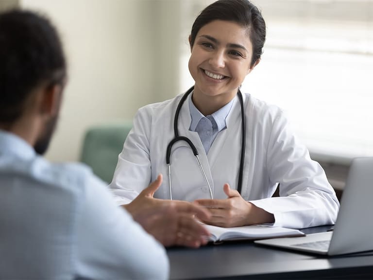 a doctor meeting with a patient