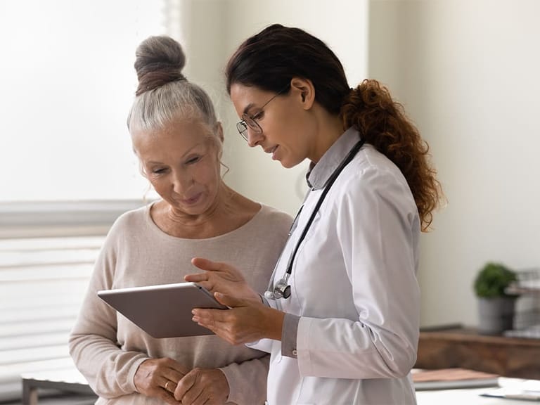 a woman talking to her doctor about menopause