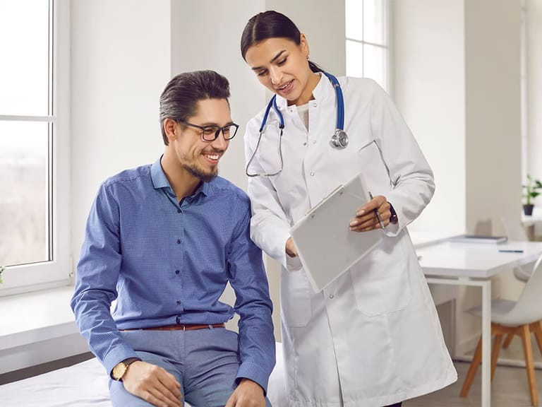 a doctor discussing how TMS therapy works