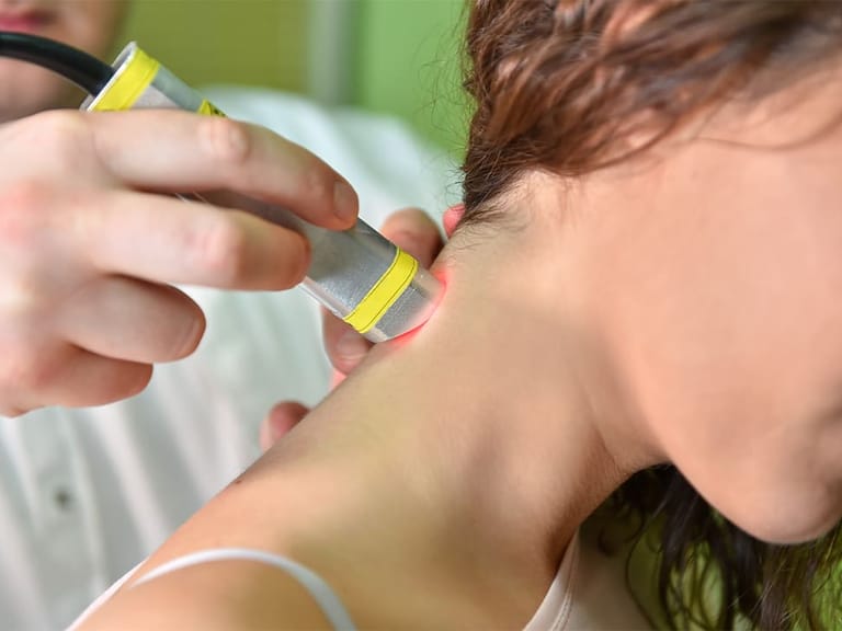 a patient receiving laser therapy