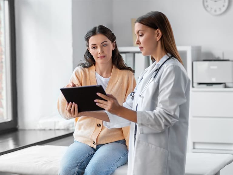 a woman talking to her doctor