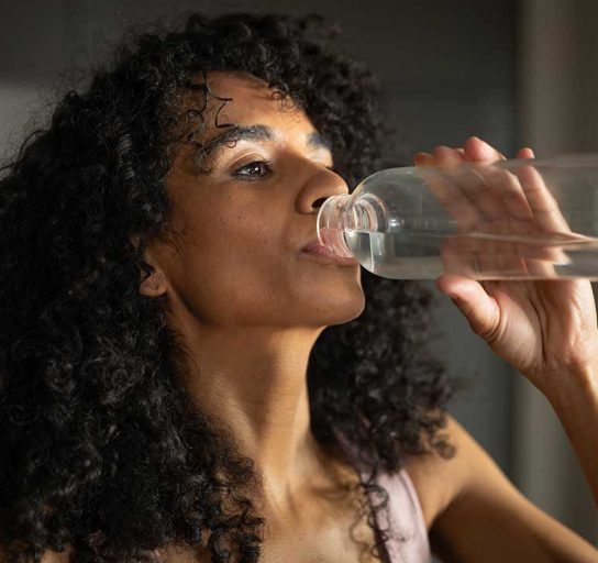 woman with excessive thirst due to hormonal imbalance
